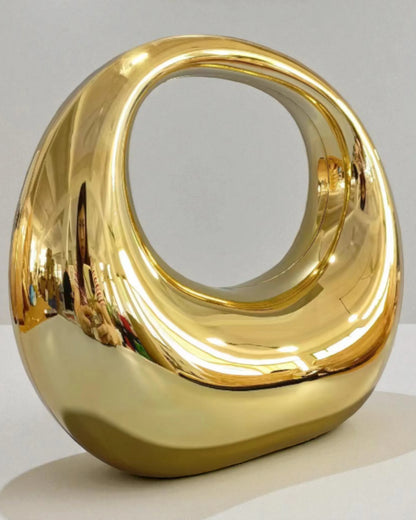 ARCO | Mala de Mão Escultural em Acrílico com Acabamento Espelhado