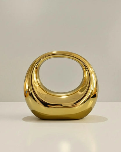 ARCO | Mala de Mão Escultural em Acrílico com Acabamento Espelhado